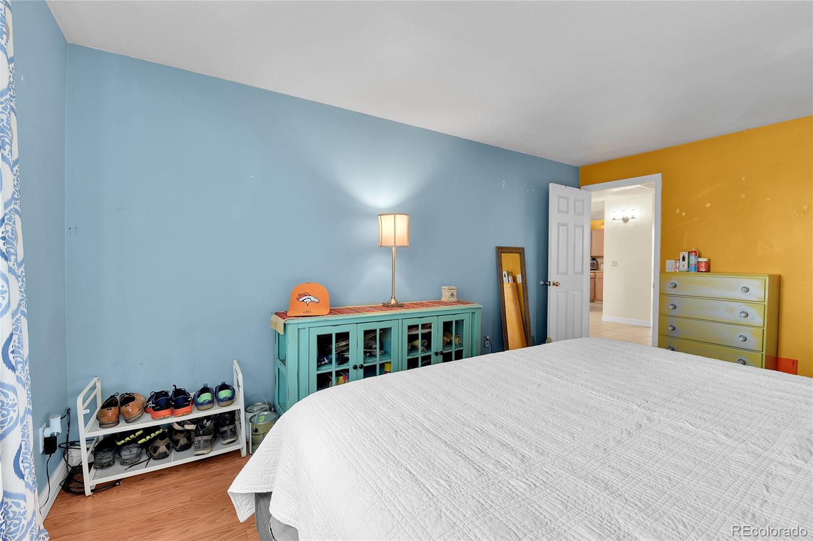 8470 Decatur Street, Unit 80 Westminster, CO 80031 - Photo 15 of 28 a bedroom with a bed and a closet