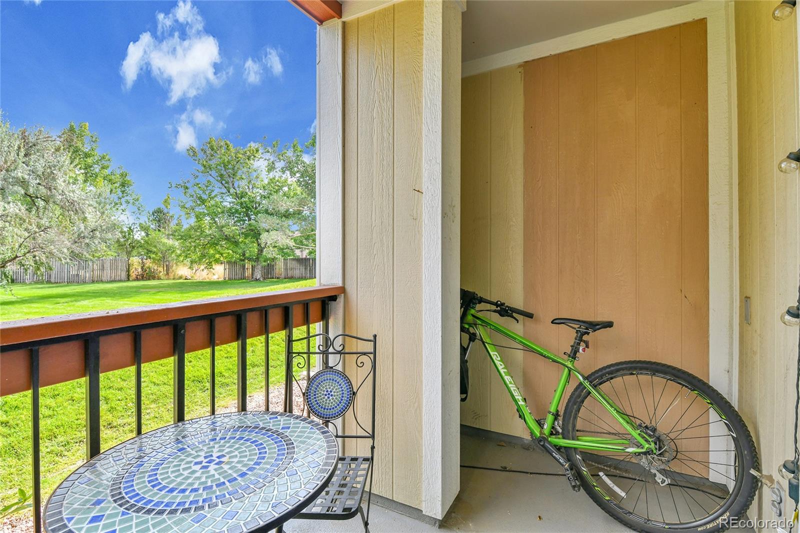 8470 Decatur Street, Unit 80 Westminster, CO 80031 - Photo 23 of 28 a view of staircase with a door and windows