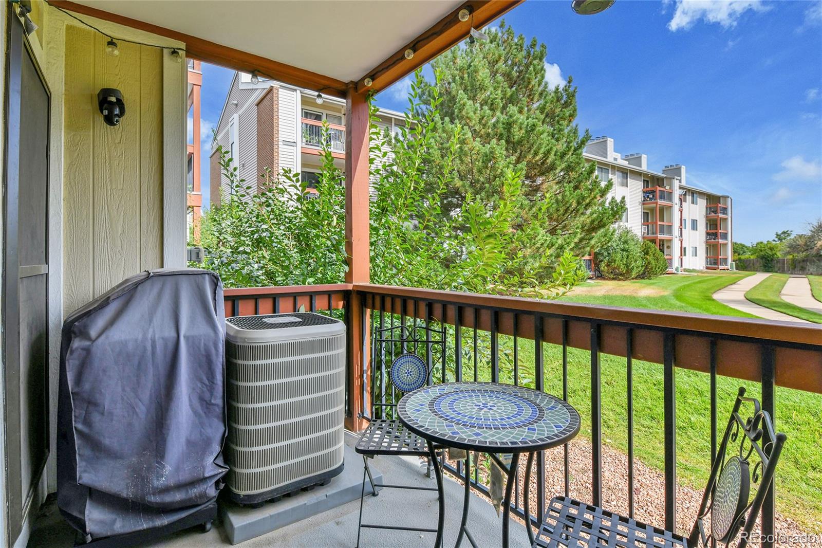 8470 Decatur Street, Unit 80 Westminster, CO 80031 - Photo 24 of 28 a view of a two chairs in the balcony