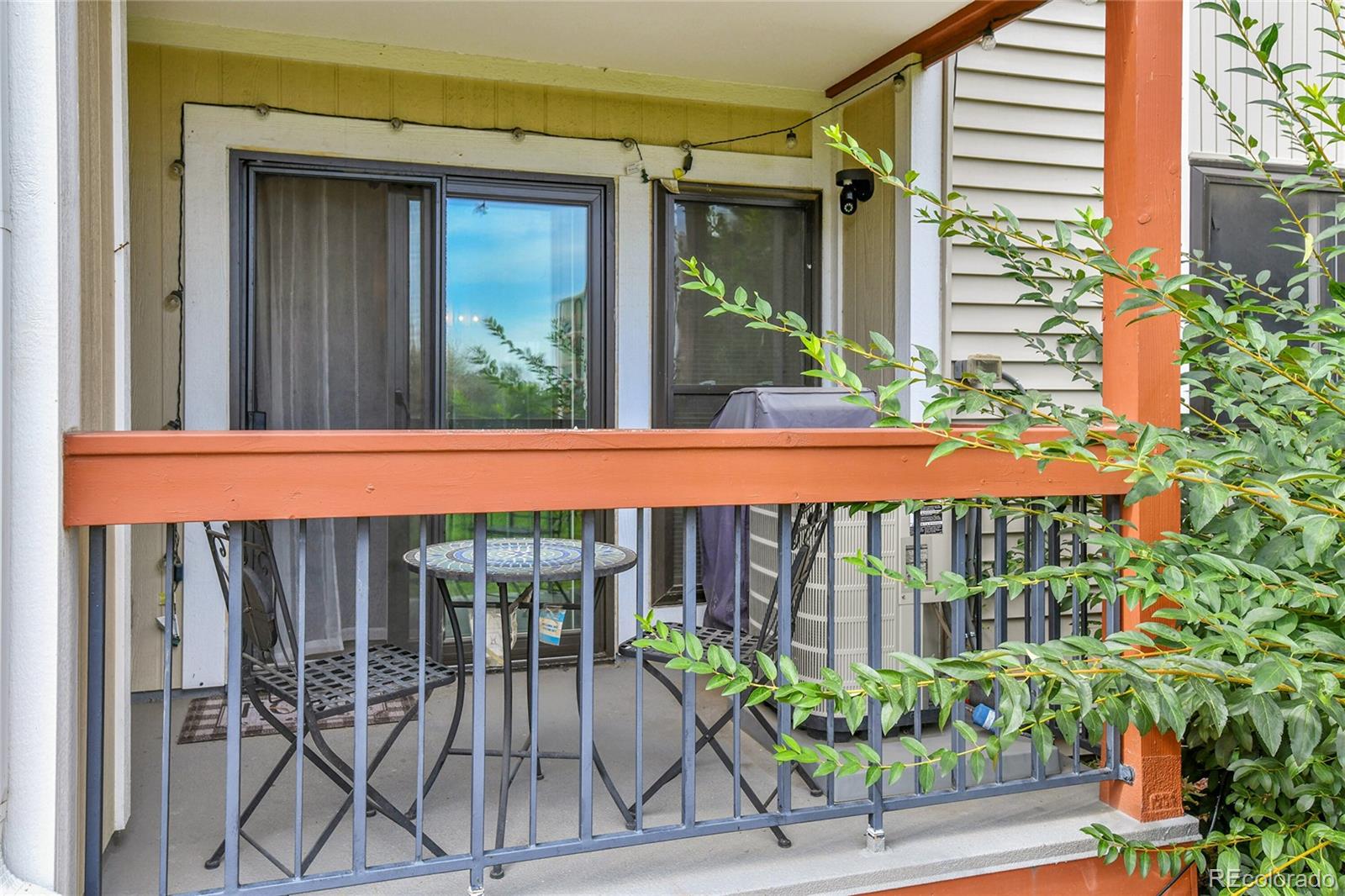 8470 Decatur Street, Unit 80 Westminster, CO 80031 - Photo 25 of 28 a view of a chair and table in the balcony