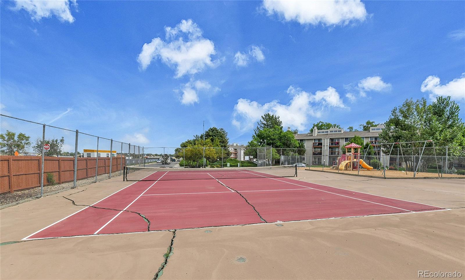 8470 Decatur Street, Unit 80 Westminster, CO 80031 - Photo 27 of 28 a view of a tennis court