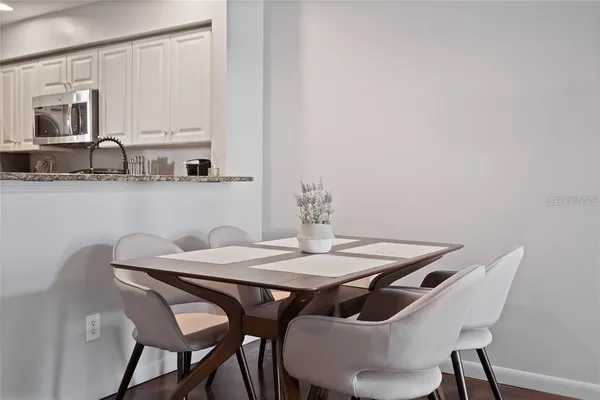 a view of a dining room with furniture