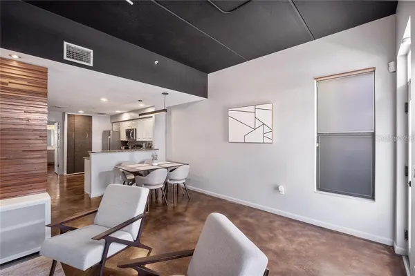 a view of a dining room with furniture