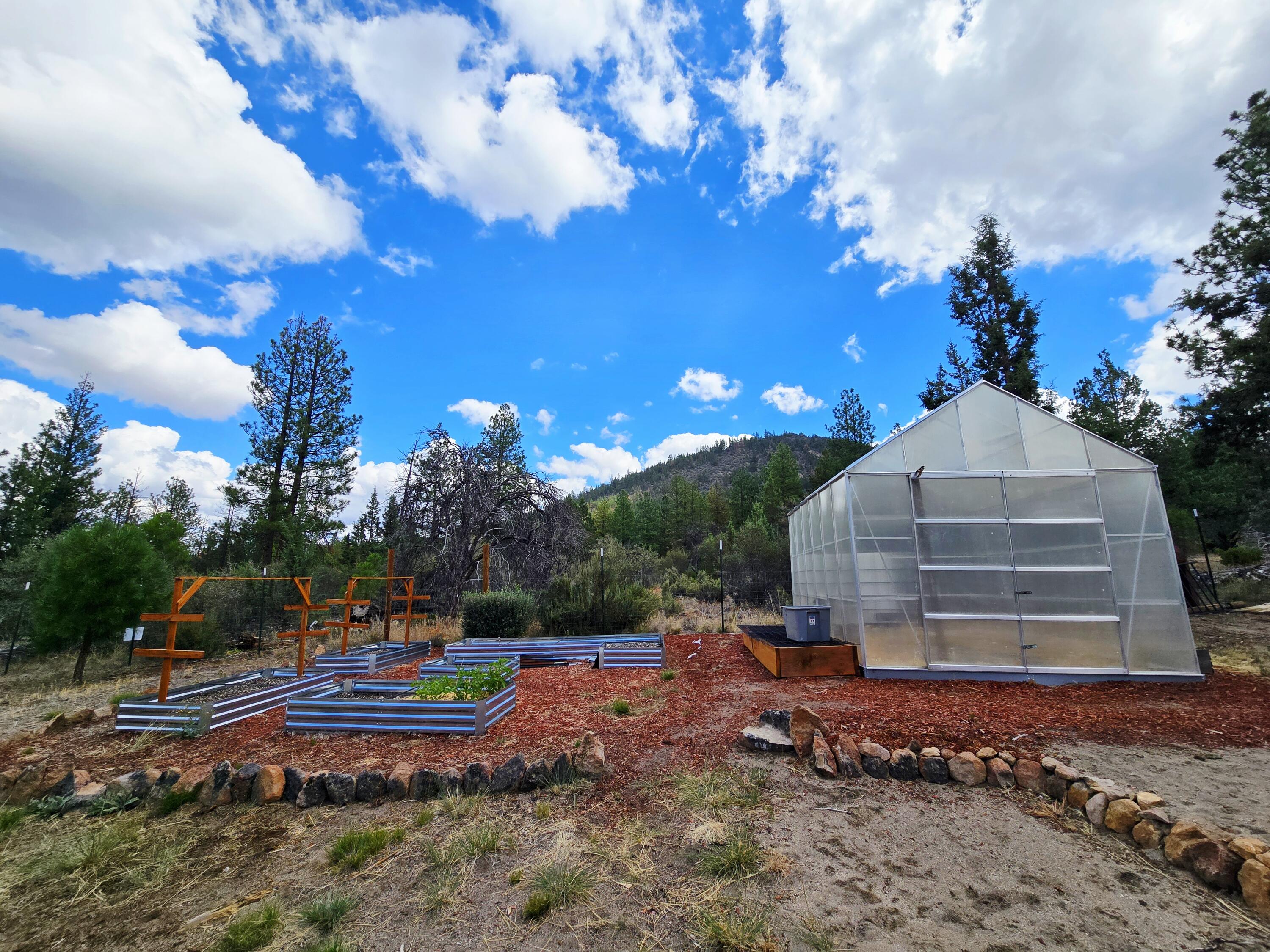 48070 Partin Drive Beatty, OR 97621 - Photo 4 of 29 The green house and the garden
