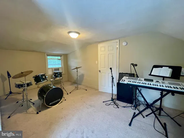 a workspace with furniture and a window