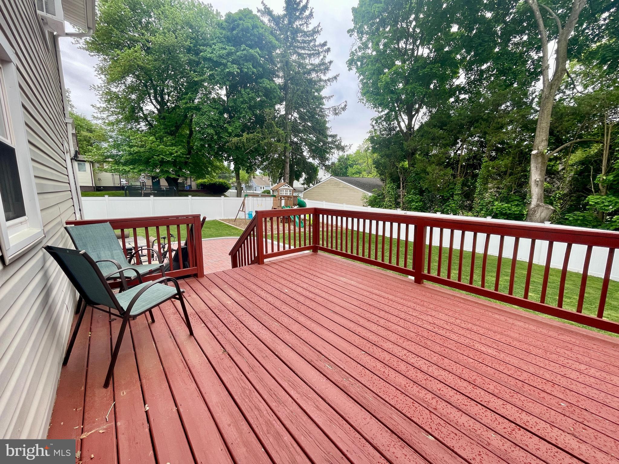 39 Mabel Street Ewing, NJ 08638 - Photo 28 of 33 a view of a wooden deck with furniture