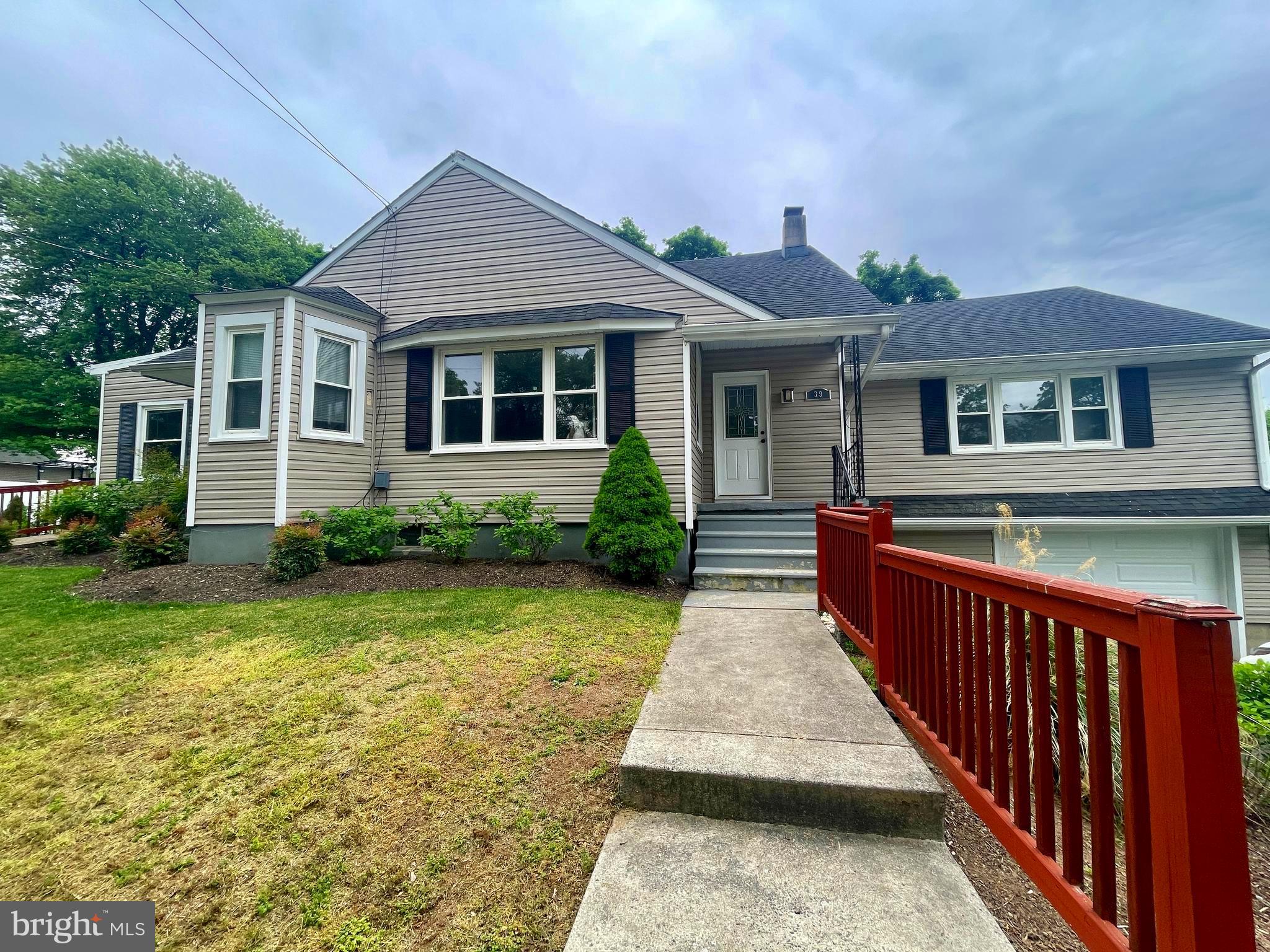 39 Mabel Street Ewing, NJ 08638 - Photo 3 of 33 a front view of a house with yard