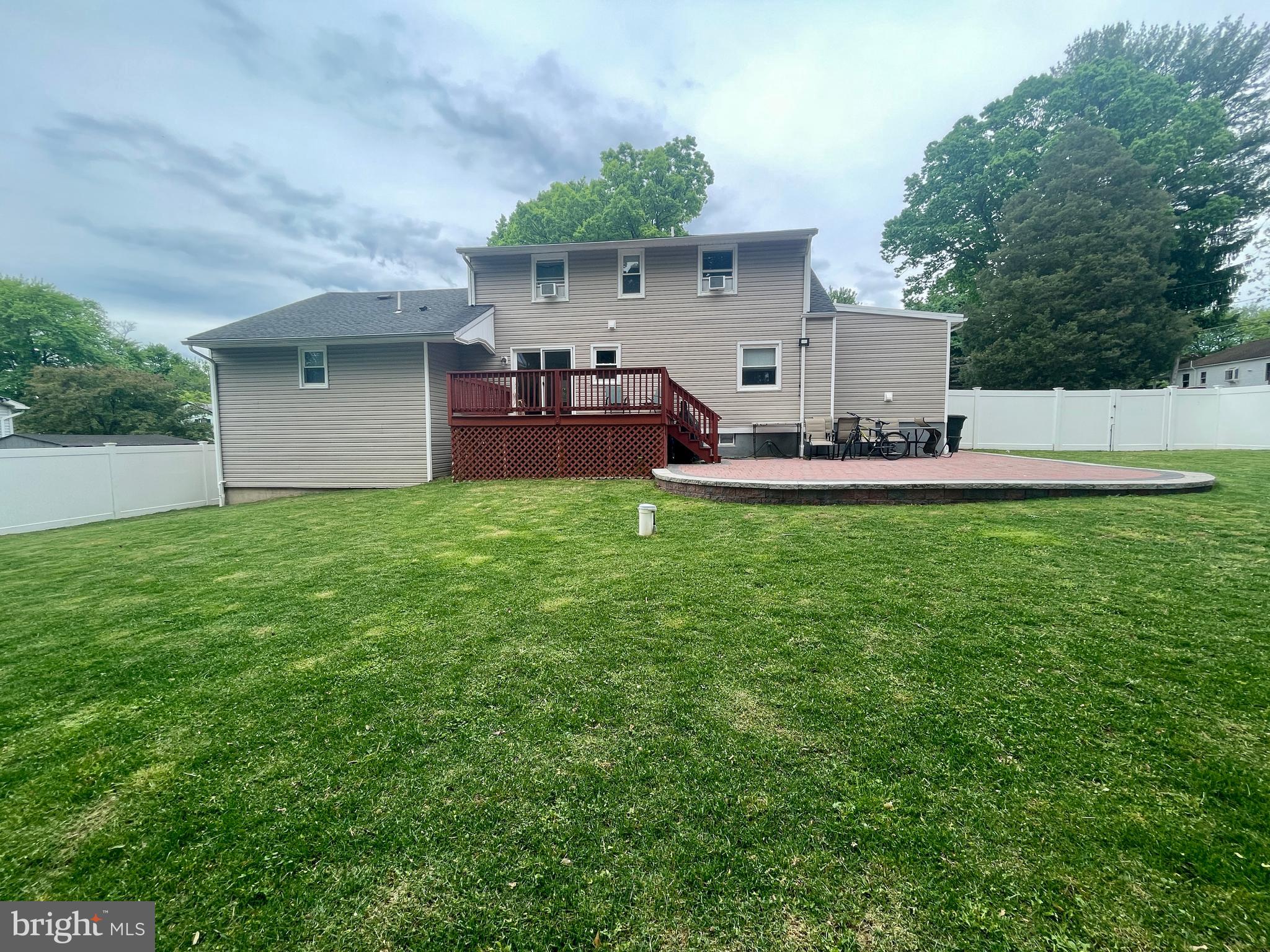 39 Mabel Street Ewing, NJ 08638 - Photo 31 of 33 a front view of a house with a yard and garage