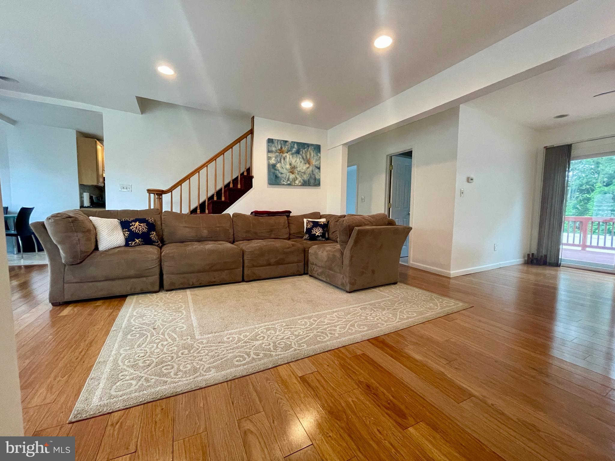 39 Mabel Street Ewing, NJ 08638 - Photo 4 of 33 a living room with furniture window and wooden floor
