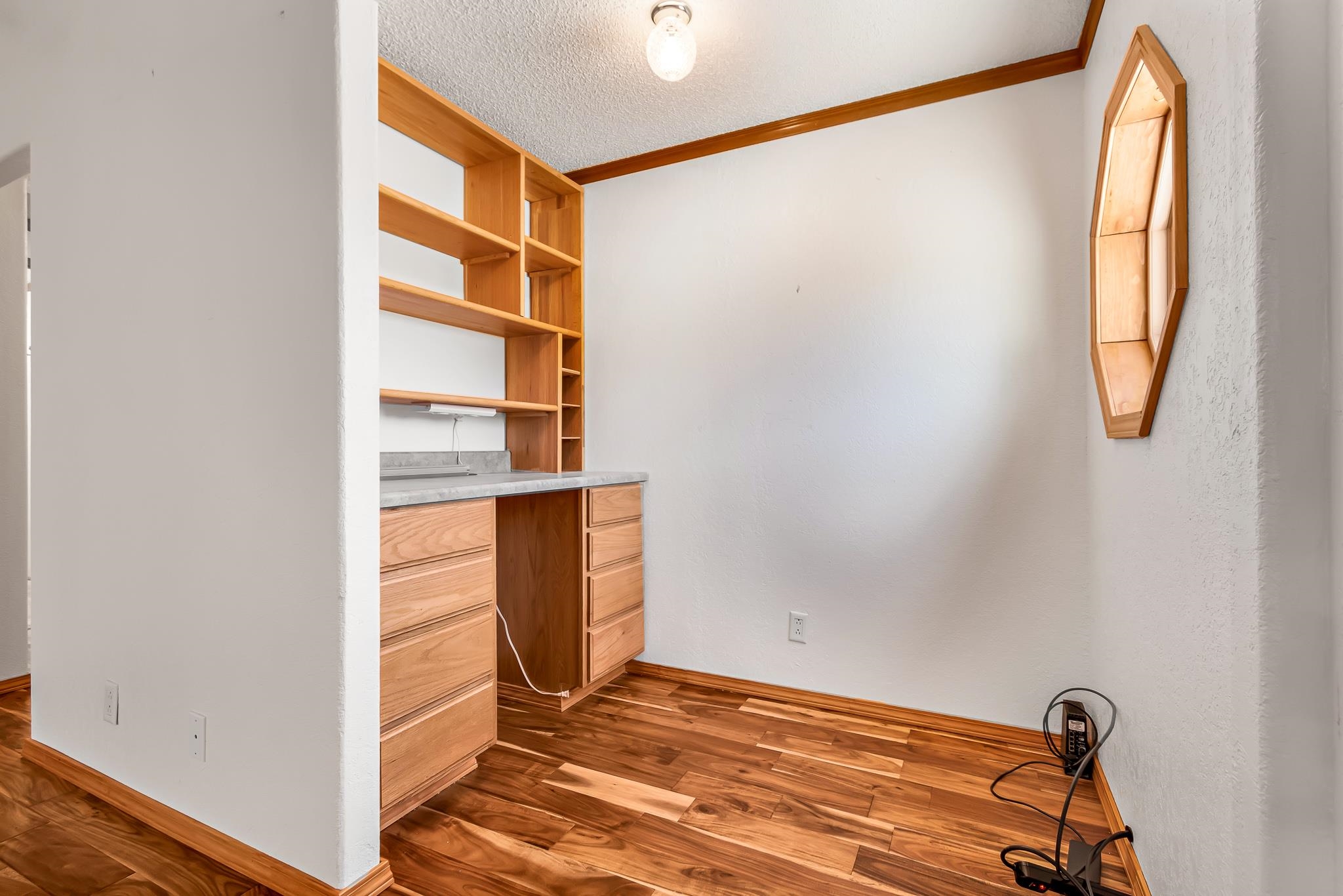 24591 Highway 64 Rangely, CO 81648 - Photo 16 of 42 a view of a room with wooden floor and windows