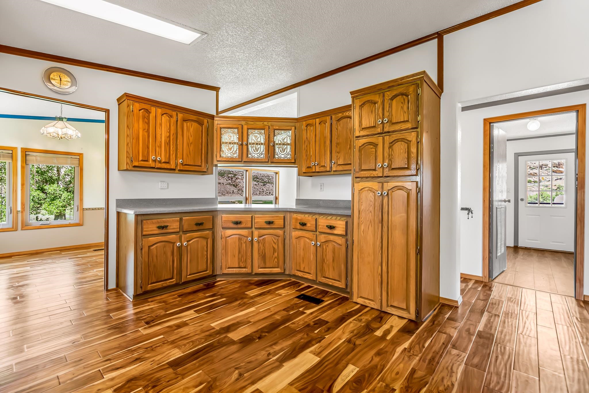 24591 Highway 64 Rangely, CO 81648 - Photo 21 of 42 a view of a kitchen with a sink and cabinets