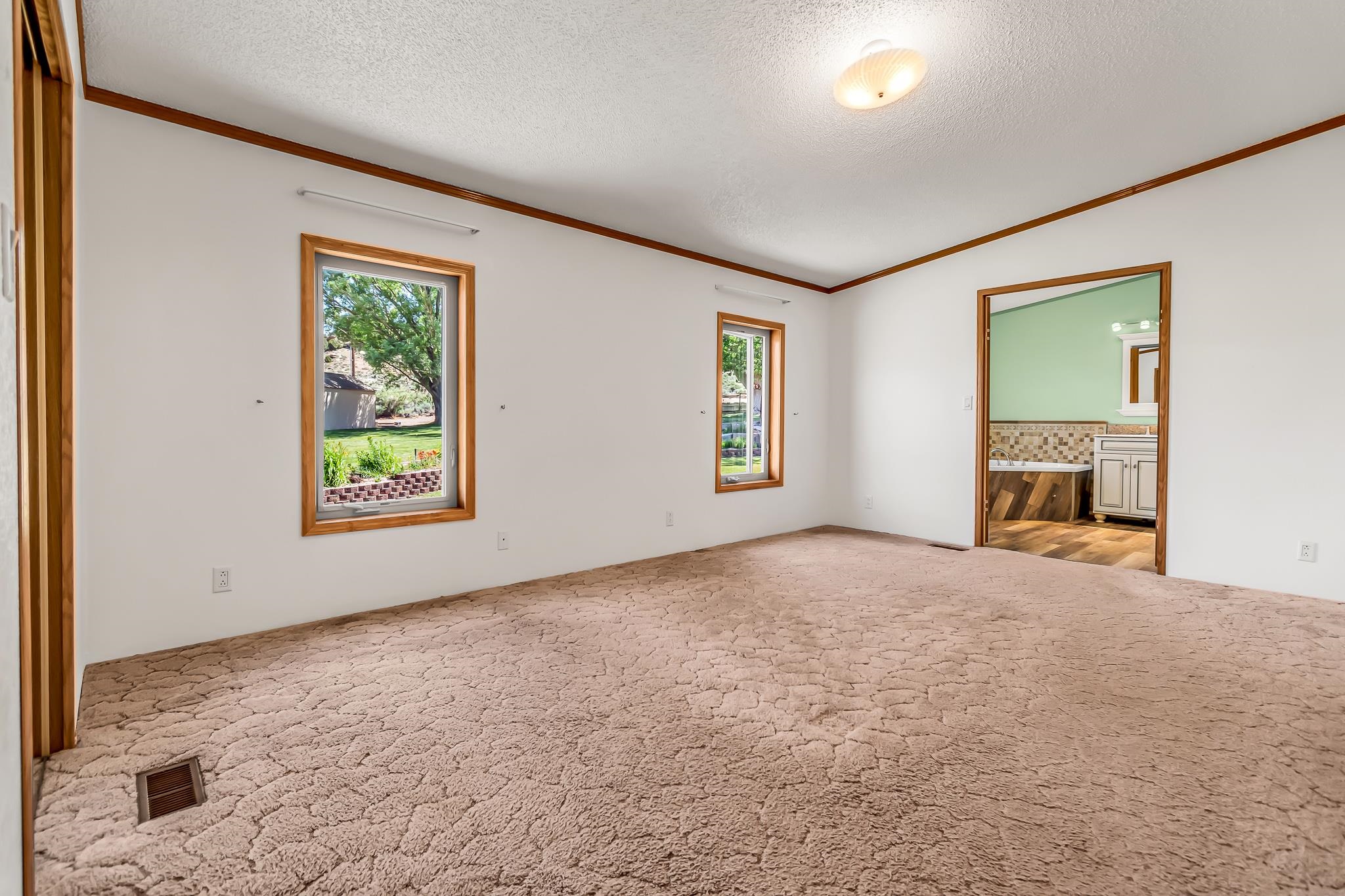 24591 Highway 64 Rangely, CO 81648 - Photo 22 of 42 a view of an empty room with a window