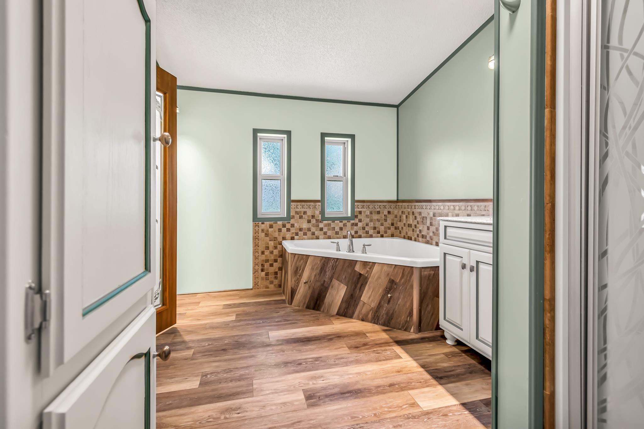 24591 Highway 64 Rangely, CO 81648 - Photo 24 of 42 a bathroom with a sink and a mirror
