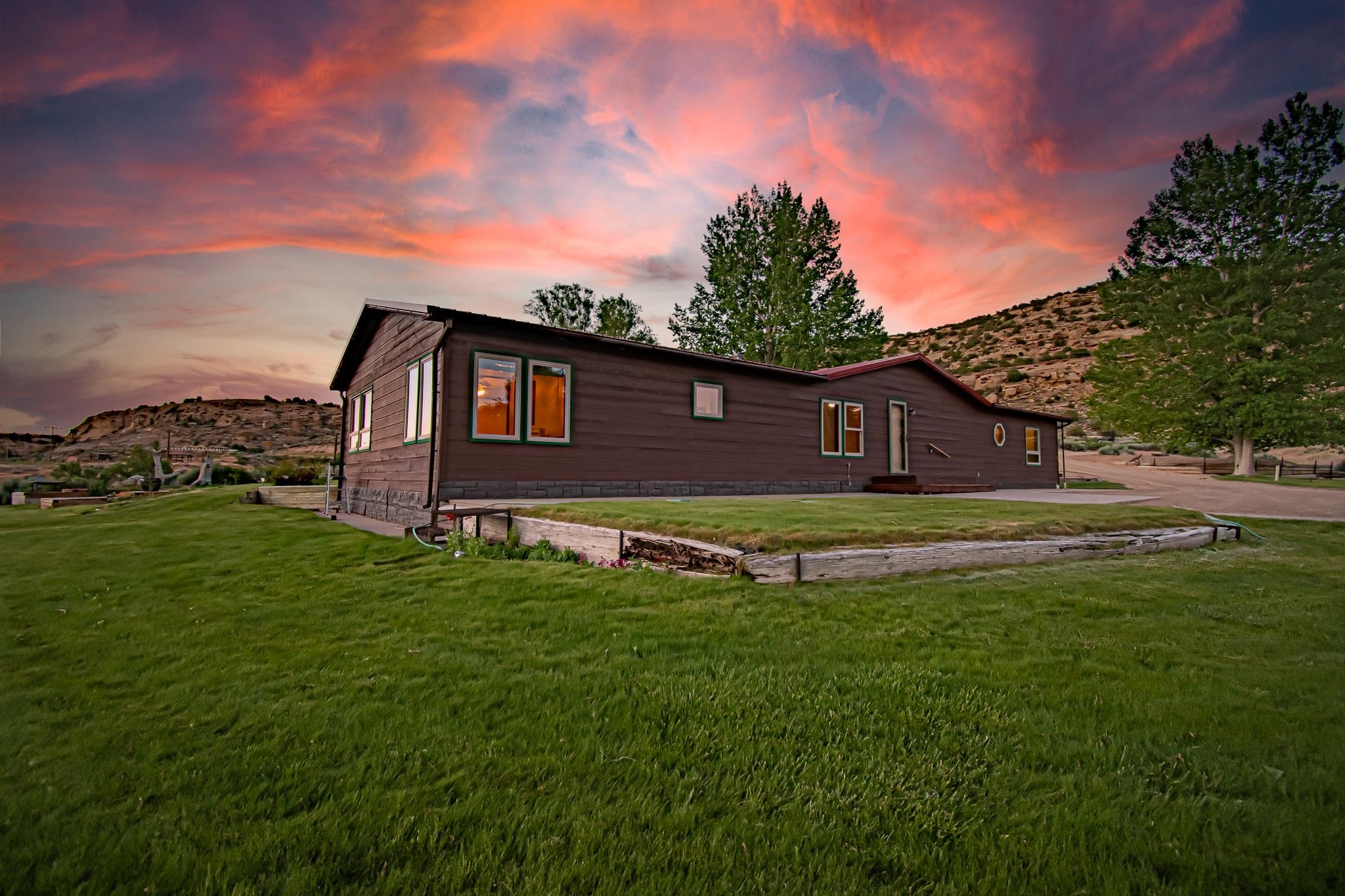 24591 Highway 64 Rangely, CO 81648 - Photo 3 of 42 a house view with a garden space