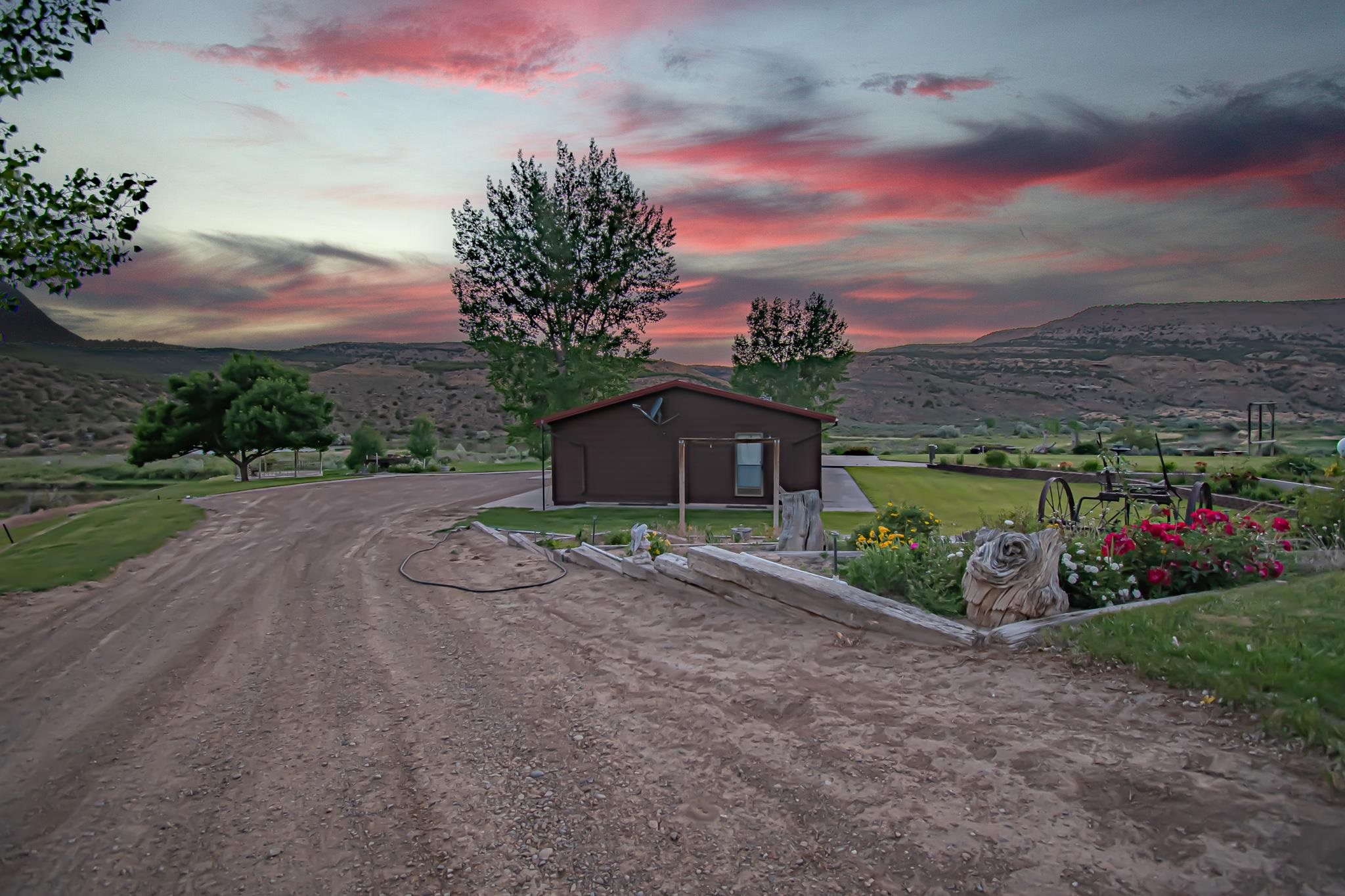24591 Highway 64 Rangely, CO 81648 - Photo 39 of 42 a view of a street with a houses
