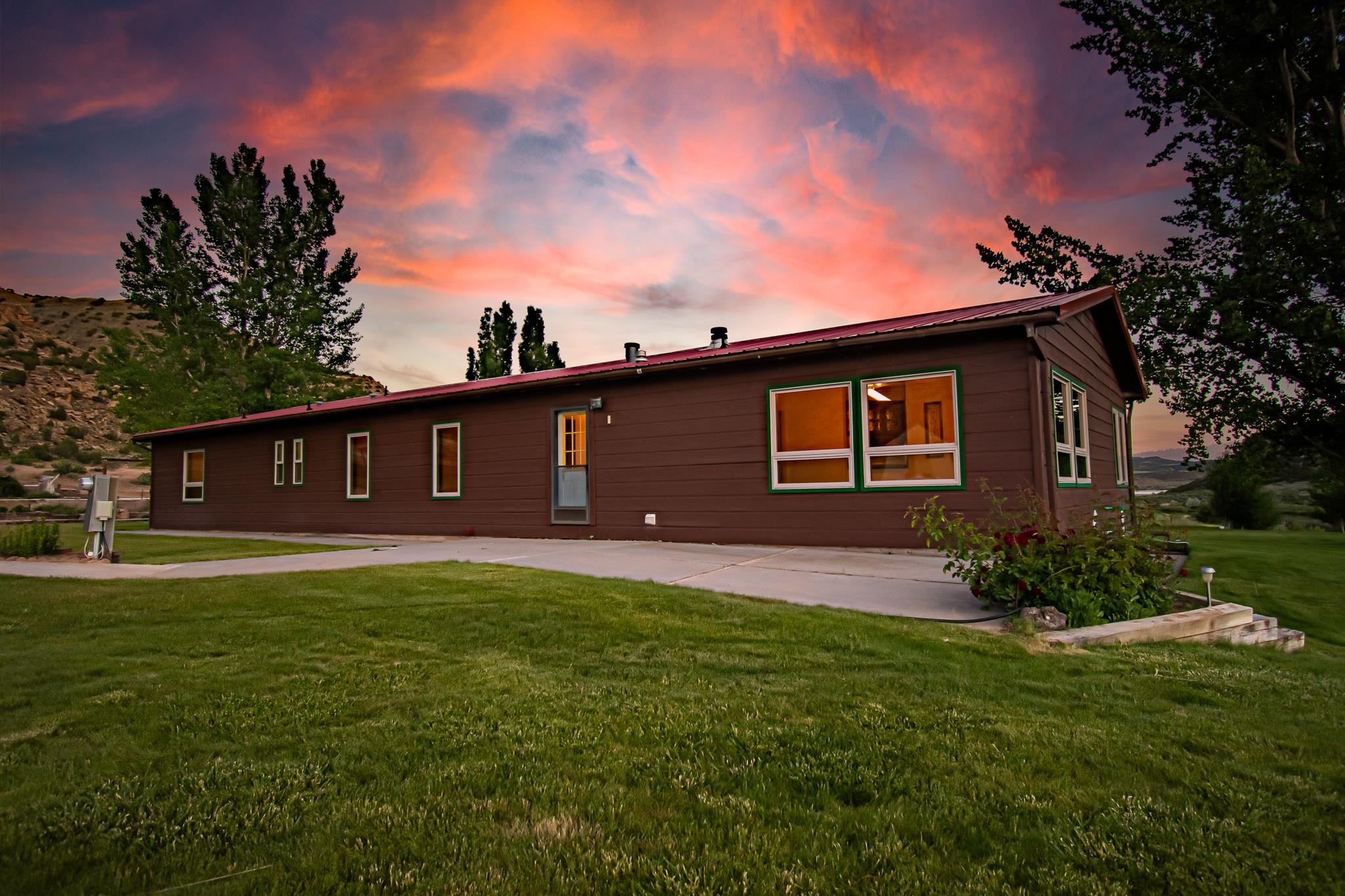 24591 Highway 64 Rangely, CO 81648 - Photo 42 of 42 a front view of a house with garden