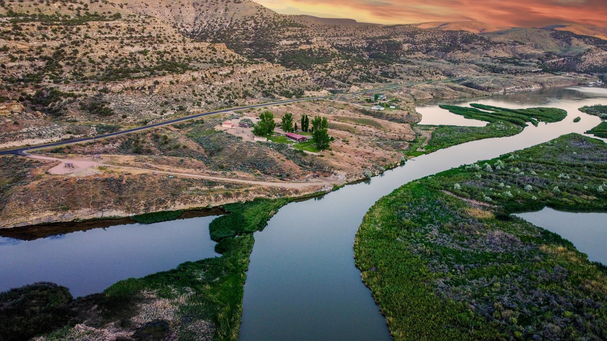 24591 Highway 64 Rangely, CO 81648 - Photo 10 of 42 an aerial view of residential houses with outdoor space and river
