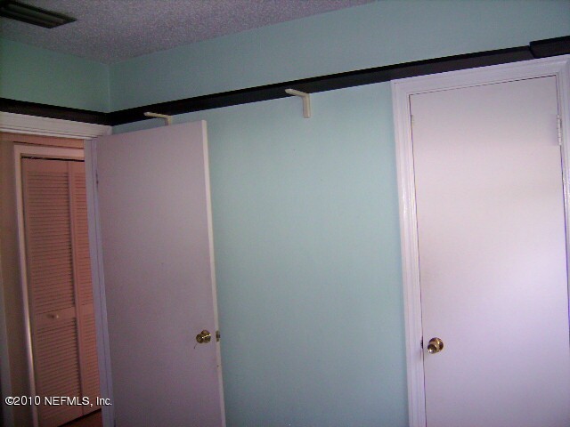 2839 Kline Road Jacksonville, FL 32246 - Photo 12 of 17 a view of walk in closet