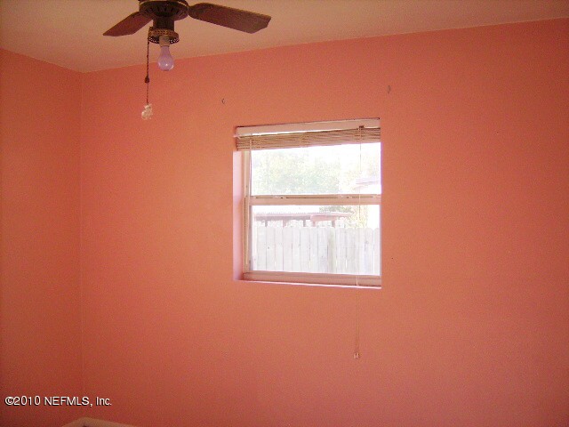 2839 Kline Road Jacksonville, FL 32246 - Photo 13 of 17 a view of an empty room with a window