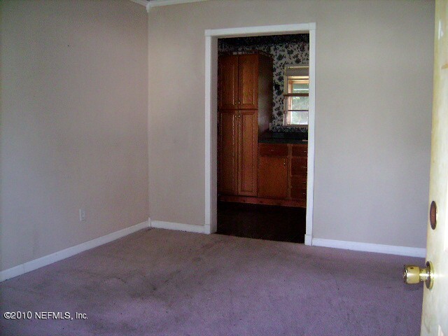 2839 Kline Road Jacksonville, FL 32246 - Photo 2 of 17 a view of an empty room and kitchen