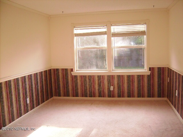 2839 Kline Road Jacksonville, FL 32246 - Photo 7 of 17 a view of wooden floor and a window