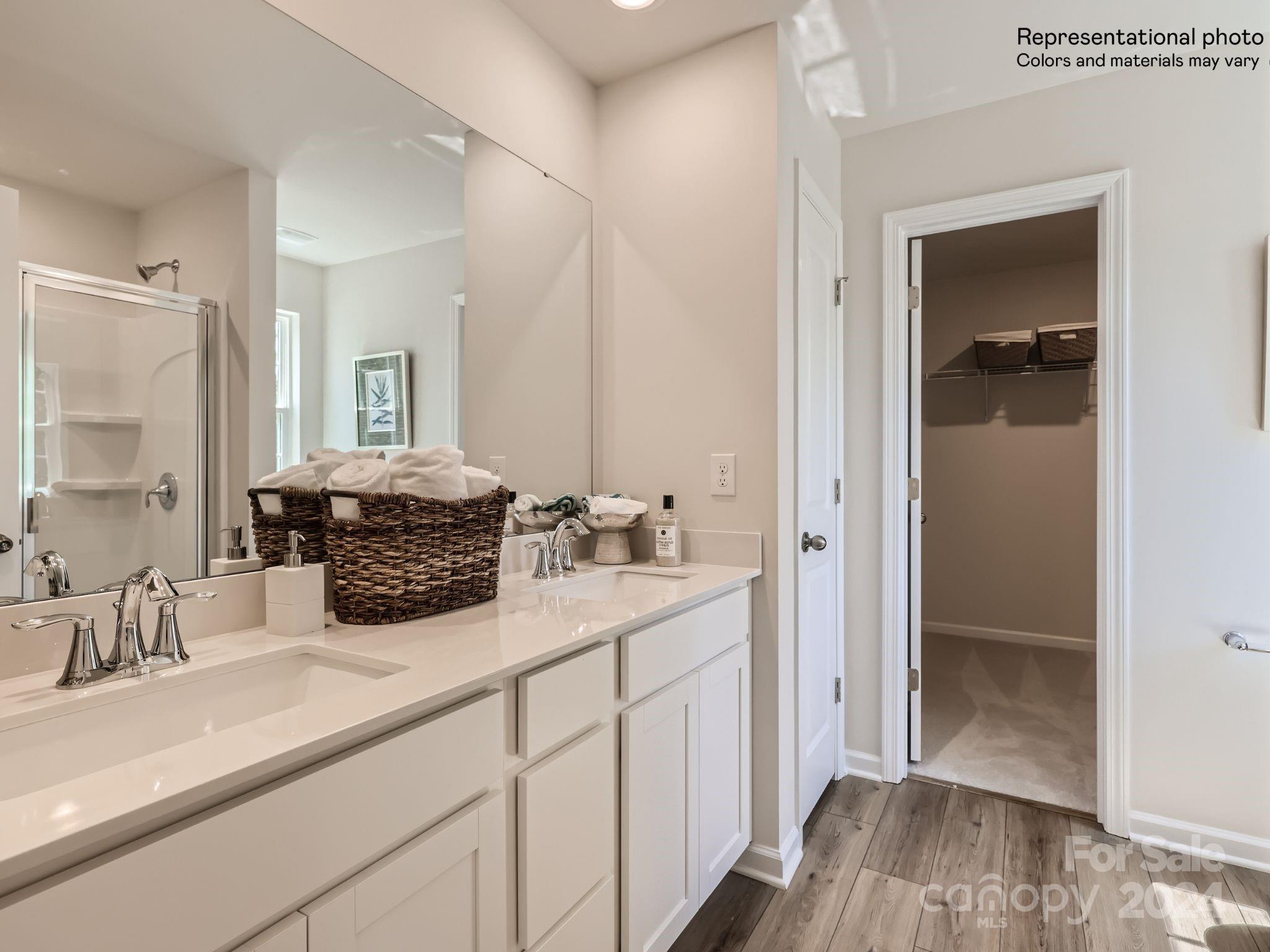15237 Windy Plns Road Charlotte, NC 28262 - Photo 19 of 24 a bathroom with sink and mirror