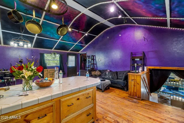 a kitchen with a sink cabinets and window