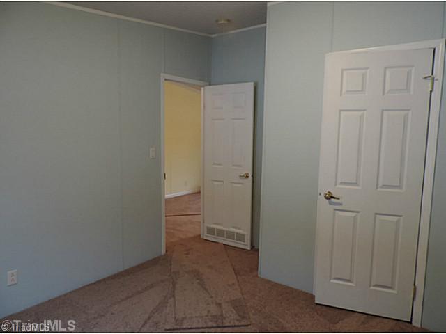 743 Lazy Branch Road Ennice, NC 28623 - Photo 14 of 16 4th Bedroom. If you don t need 4 bedrooms then this room with lots of natural light would make an excellent office/hobby room!