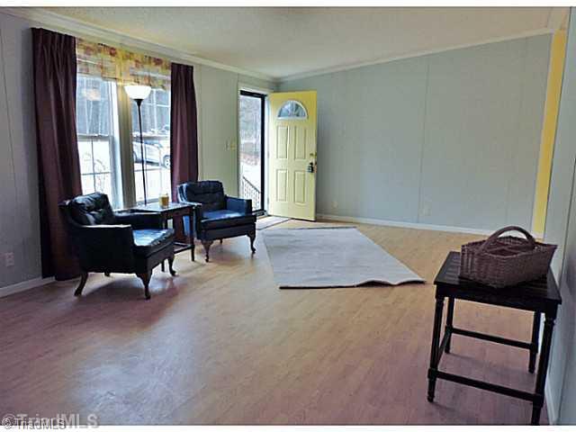 743 Lazy Branch Road Ennice, NC 28623 - Photo 8 of 16 Living Room. Welcome your guests into this beautiful living room!