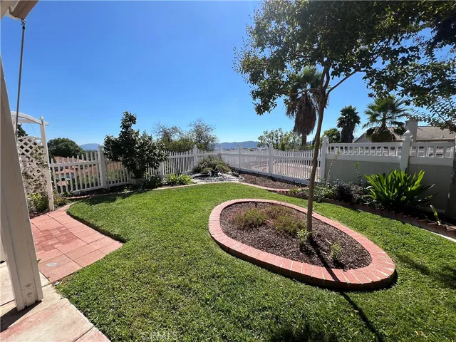 a garden view with a seating space