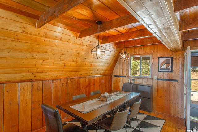 1644 West Tollgate Cyn Road, Unit 79AM Coalville, UT 84017 - Photo 10 of 31 Wood paneling throughout, exposed wood beams, and a built-in window