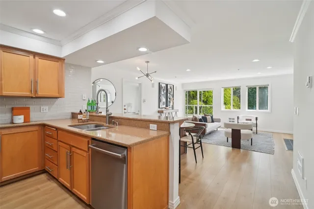 a kitchen with lots of counter top space and living room