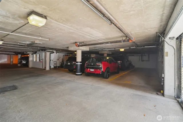 a view of a garage with cars