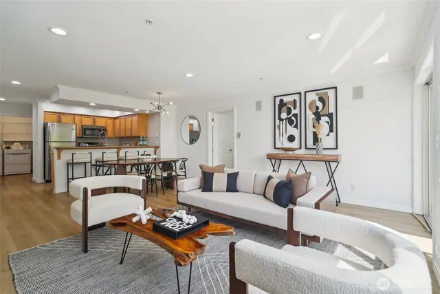 a living room with furniture and a table