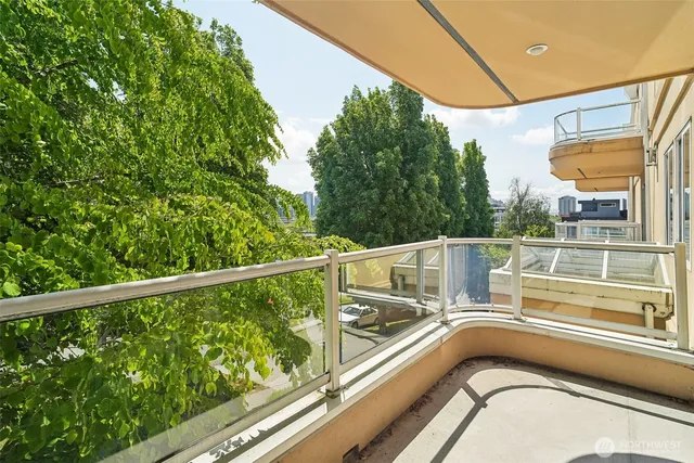 a view of a balcony with chairs