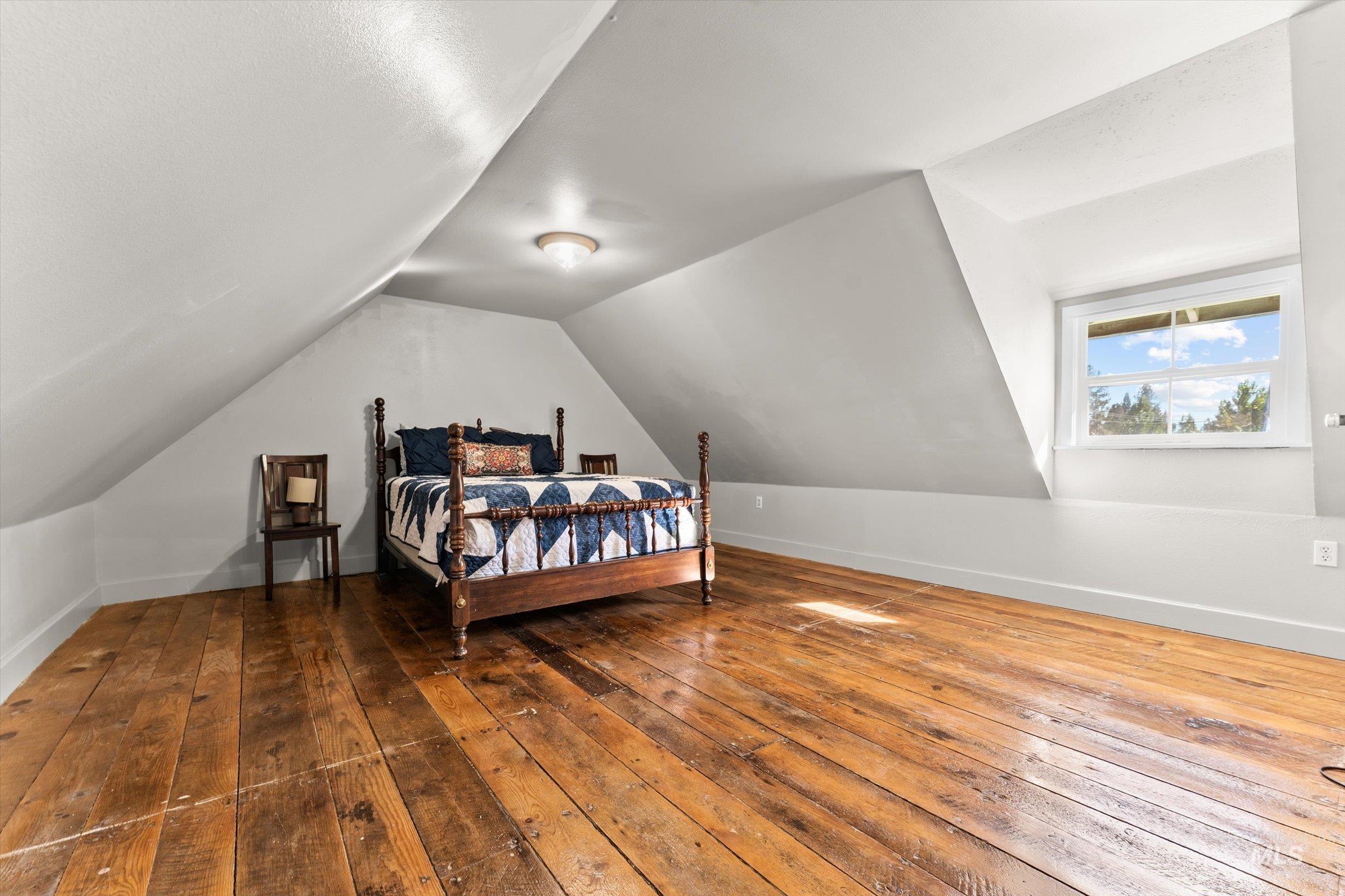 315 South Middlefork Road Garden Valley, ID 83622 - Photo 33 of 49 Bedroom with hardwood / wood-style floors and vaulted ceiling