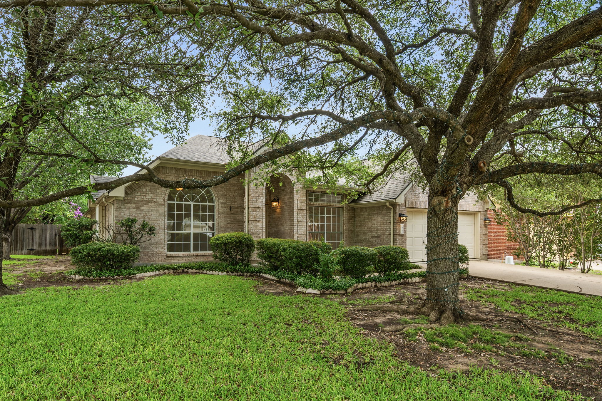 707 Ridge View Drive Leander, TX 78641 - Photo 3 of 40 a front view of a house with garden