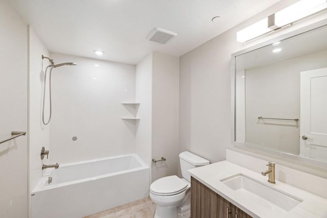 a view of washer and dryer in a utility room