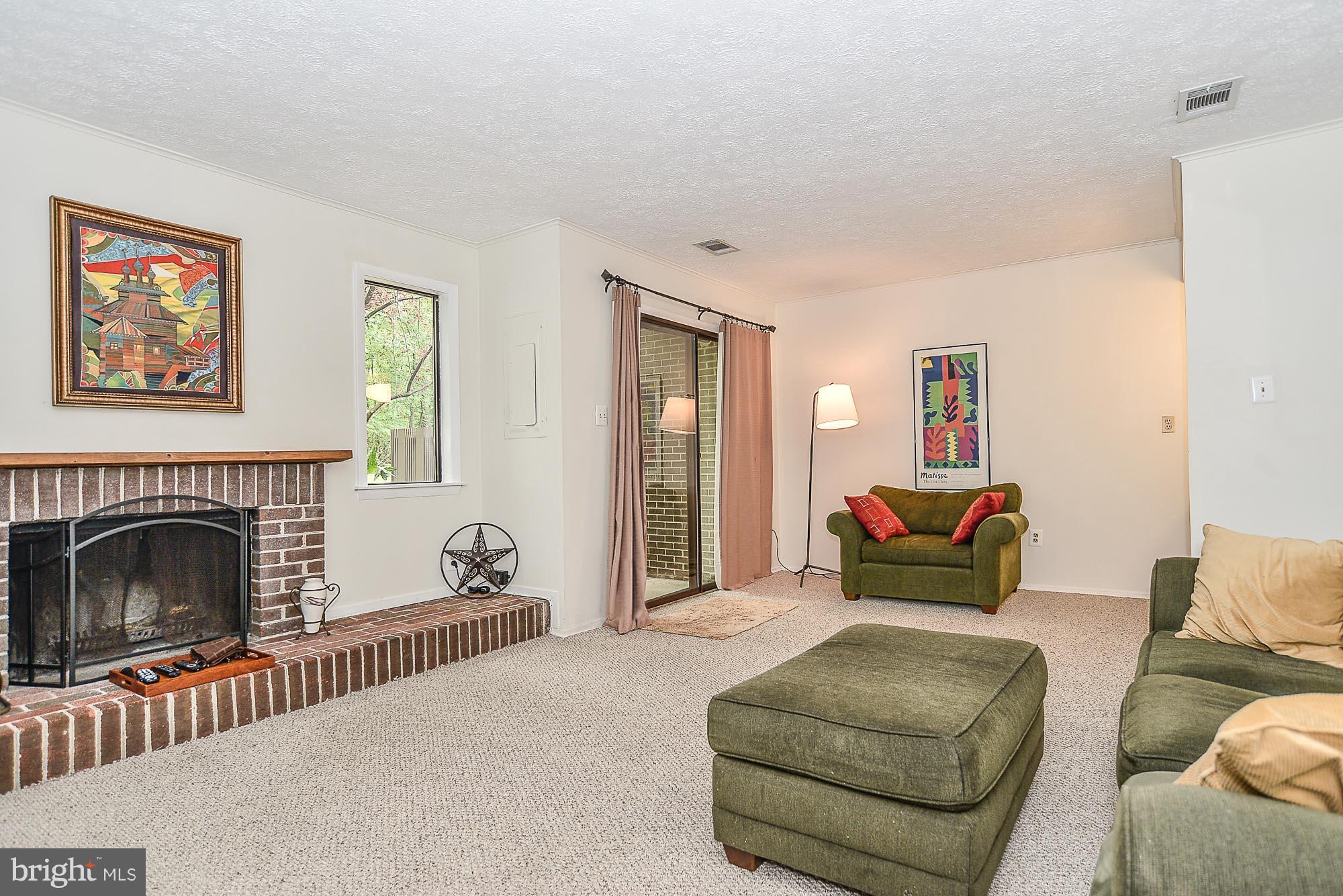 2001 Winged Foot Court Reston, VA 20191 - Photo 24 of 30 Family Room with large Fireplace to Patio