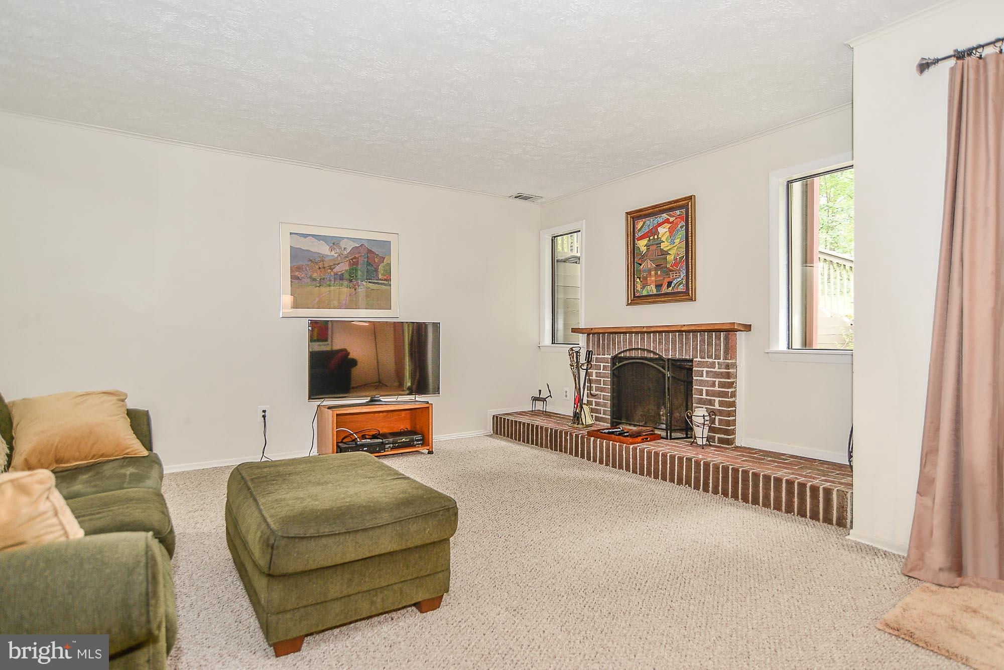 2001 Winged Foot Court Reston, VA 20191 - Photo 26 of 30 Family Room/Fireplace and lots of natural light