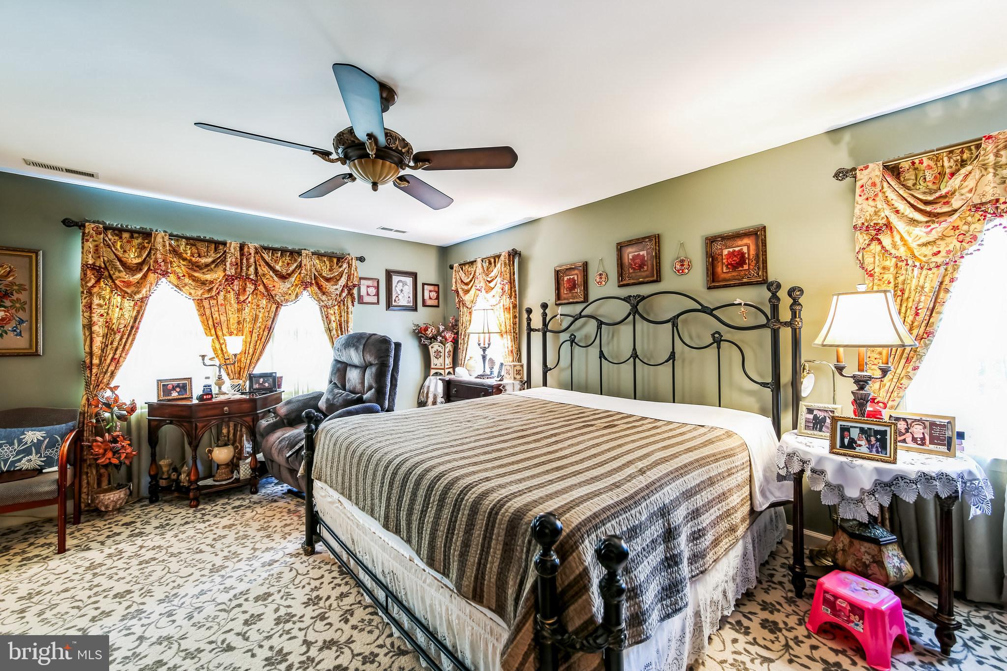 1096 Dexter Corner Road Townsend, DE 19734 - Photo 24 of 67 a bedroom with a bed dresser and a window