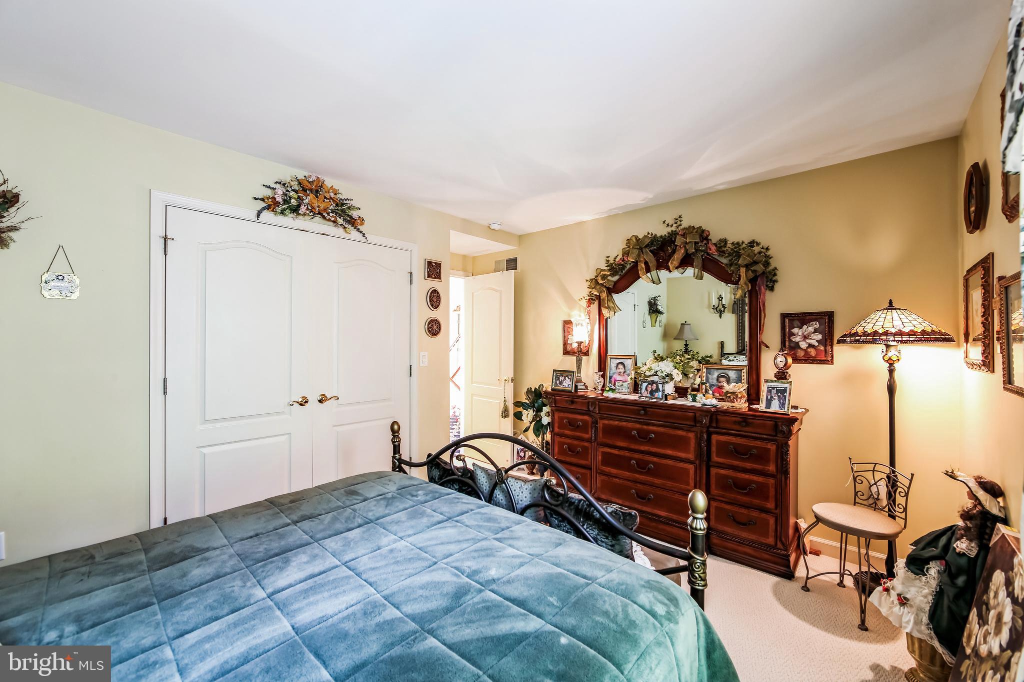 1096 Dexter Corner Road Townsend, DE 19734 - Photo 29 of 67 a bed room with a bed and furniture