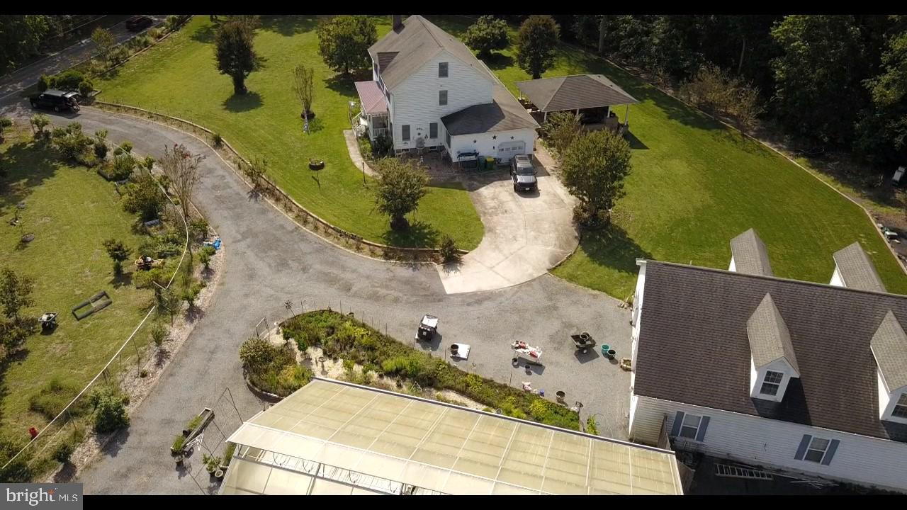 1096 Dexter Corner Road Townsend, DE 19734 - Photo 61 of 67 an aerial view of a house with a swimming pool