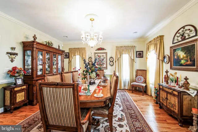 a view of a livingroom with furniture window and wooden floor