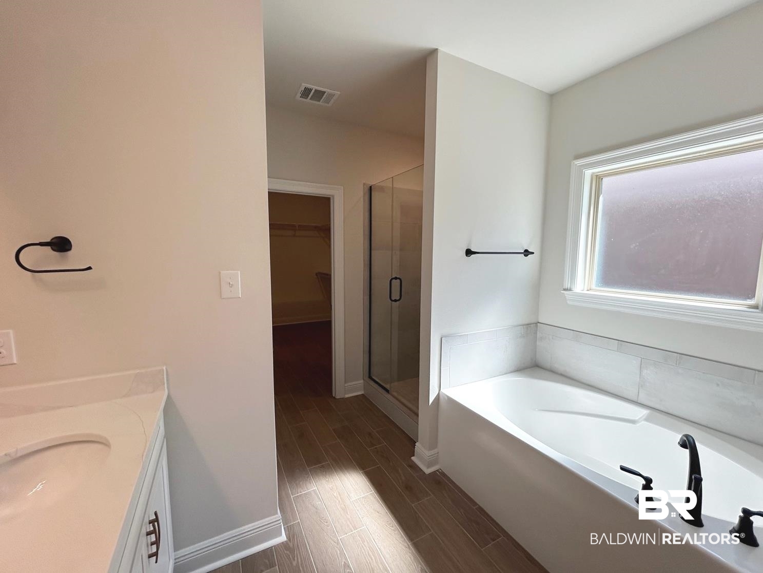872 Sumter Loop Foley, AL 36535 - Photo 7 of 18 Bathroom featuring vanity and independent shower and bath