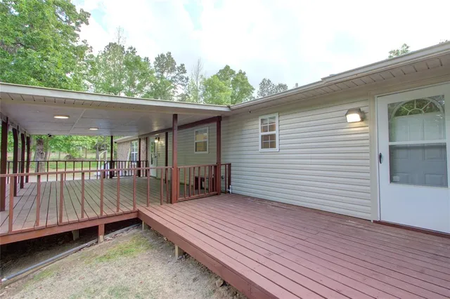 a backyard of a house with a fountain