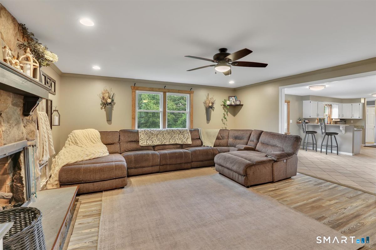 122 Antrim Road Coventry, CT 06238 - Photo 37 of 40 Bright open floor plan from living room into kitchen.