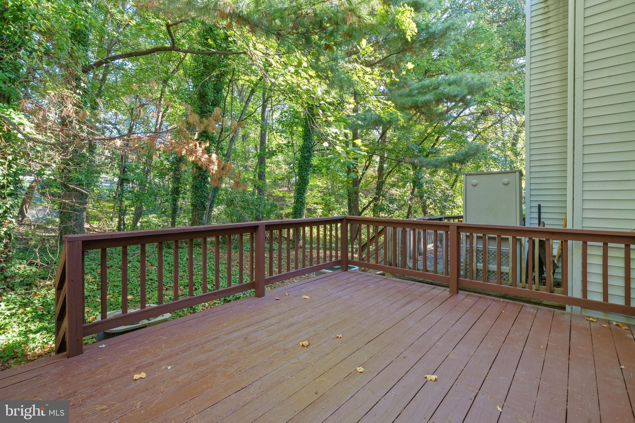 1132 Ingate Road, Unit 1132 Baltimore, MD 21227 - Photo 26 of 35 a view of balcony with wooden floor