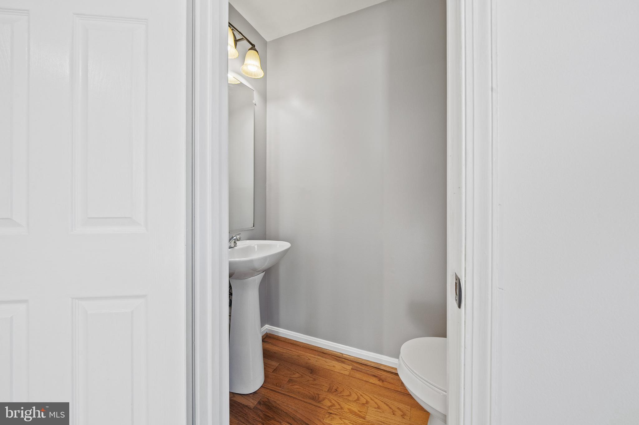 1132 Ingate Road, Unit 1132 Baltimore, MD 21227 - Photo 10 of 35 a bathroom with a sink