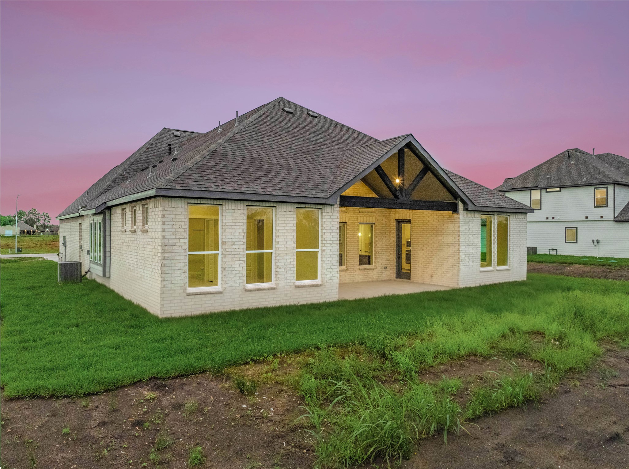 4602 Magnolia Bend Drive Rosharon, TX 77583 - Photo 31 of 39 a front view of a house with a yard